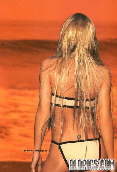 Jaime Pressly in a bikini - ass