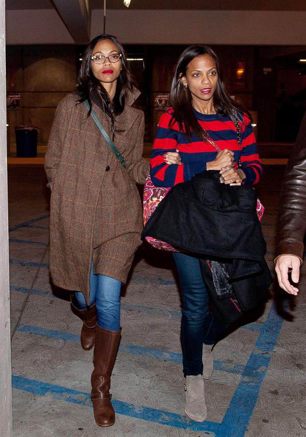 Zoe Saldana arrives at Los Angeles International Airport (05.02.2013) 