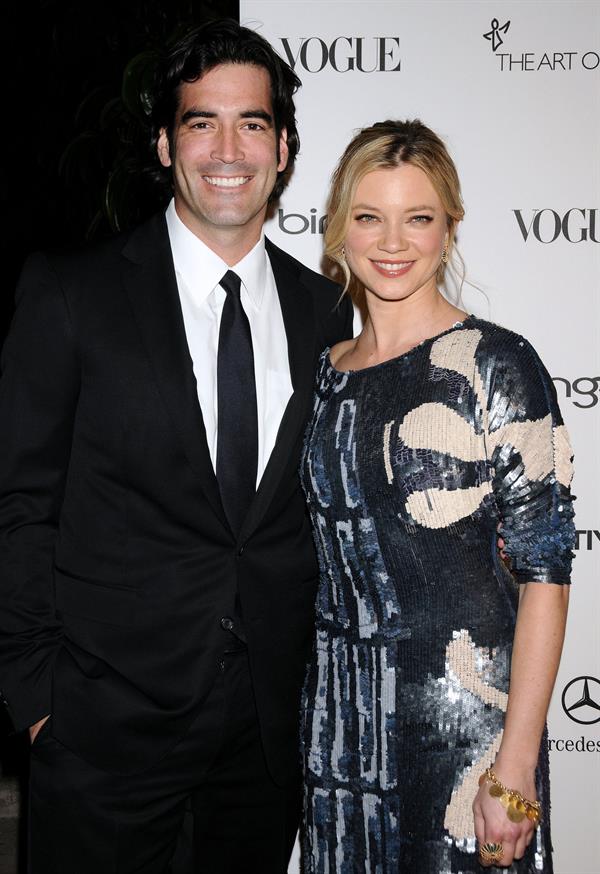 Amy Smart attends the Art of Elysium Heaven Gala 2011 on January 15, 2011