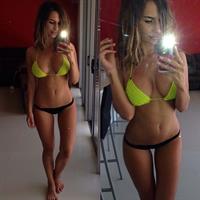 Rosanna Arkle in a bikini taking a selfie
