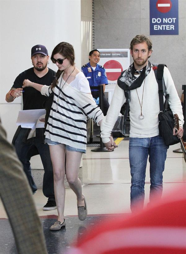 Anne Hathaway arrives at LAX airport in Los Angeles on September 3, 2011