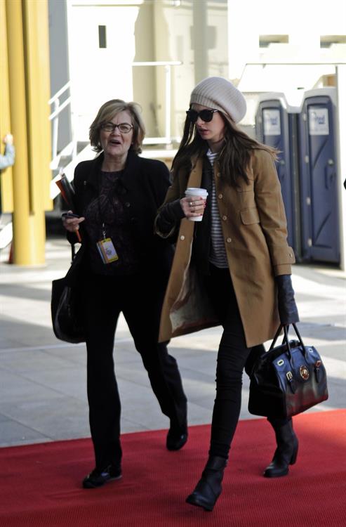 Anne Hathaway Pictures Anne Hathaway enters Kennedy Center for rehearsals on December 3, 2011