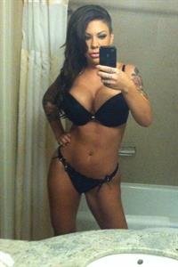 Anonymous in a bikini taking a selfie