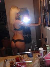 Anonymous in lingerie taking a selfie and - ass