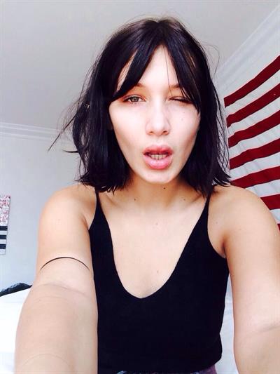 Bella Hadid taking a selfie