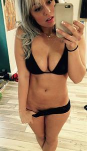 Anonymous in a bikini taking a selfie