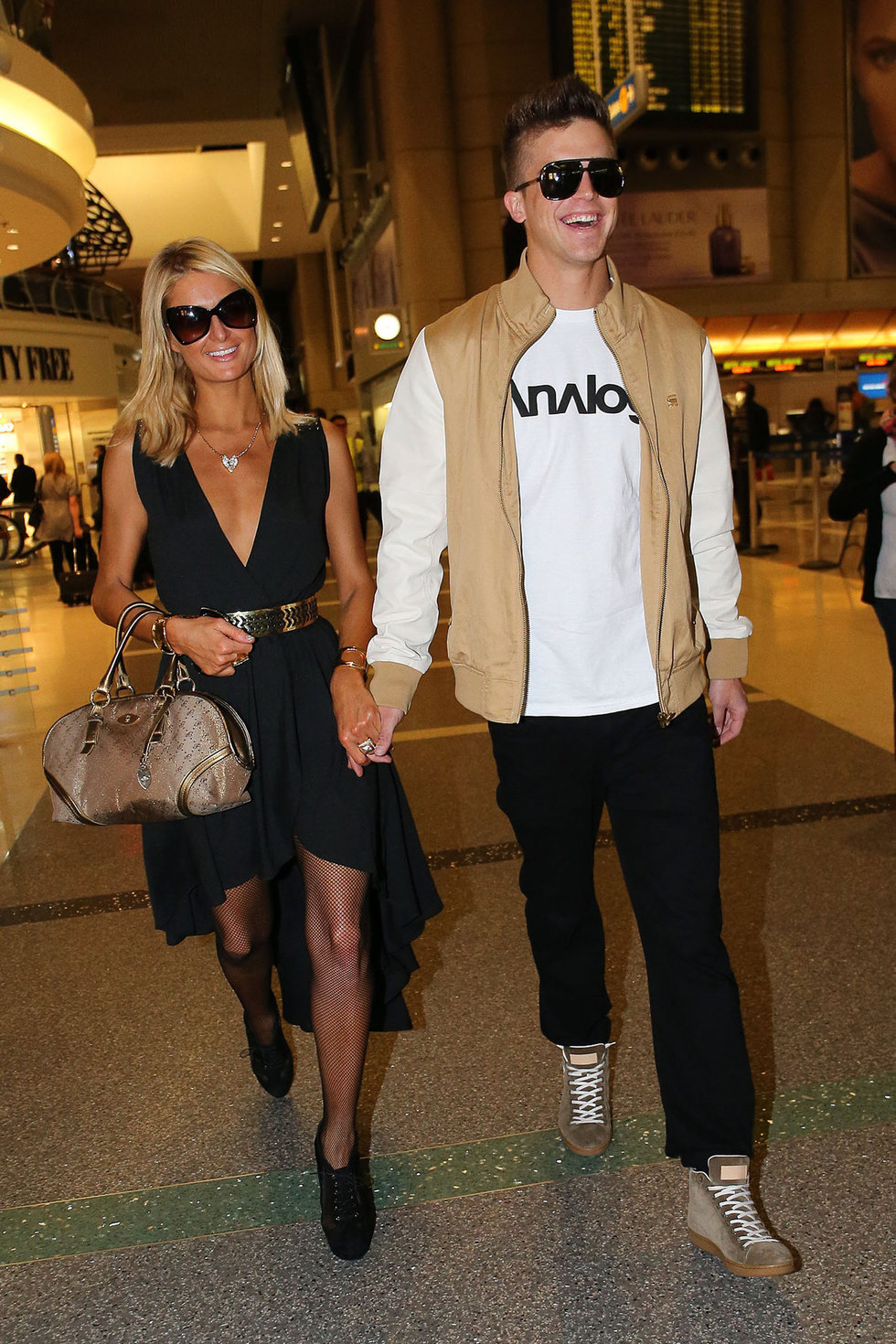 Paris Hilton arrives at LAX on January 25, 2013