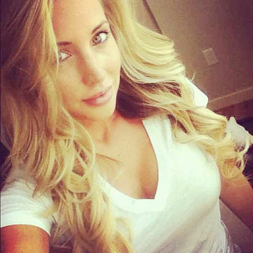 Samantha Saint in a bikini taking a selfie