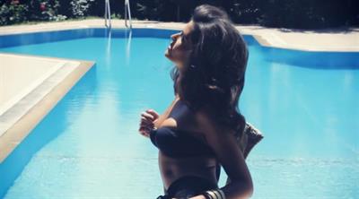 Berrak Tüzünataç in a bikini