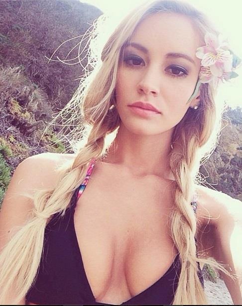 Bryana Holly in a bikini taking a selfie