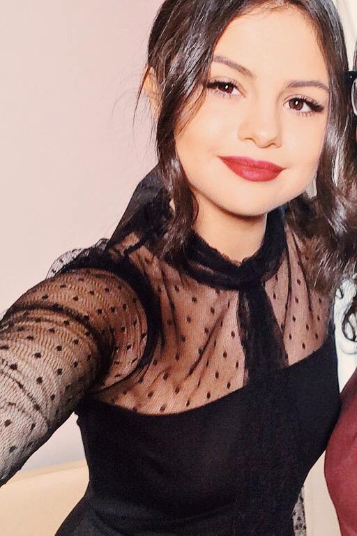 Selena Gomez taking a selfie