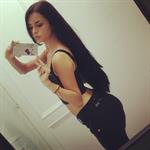 Demi Rose Mawby taking a selfie