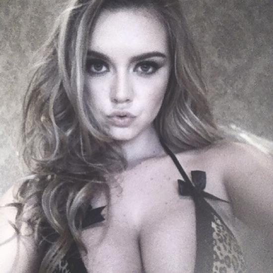 Lauren Hanley in a bikini taking a selfie