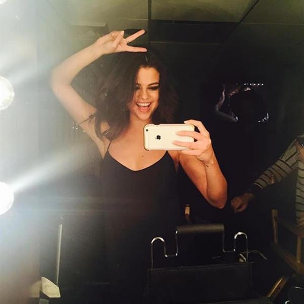 Selena Gomez taking a selfie