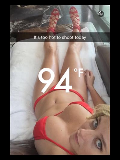Genevieve Morton in a bikini taking a selfie