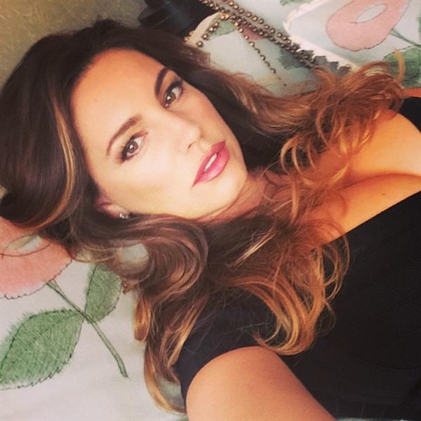 Kelly Brook taking a selfie