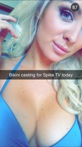 Annelise Marie in a bikini taking a selfie