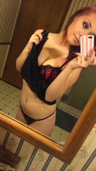 Anonymous in lingerie taking a selfie
