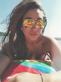 Alicia Michaela in a bikini taking a selfie
