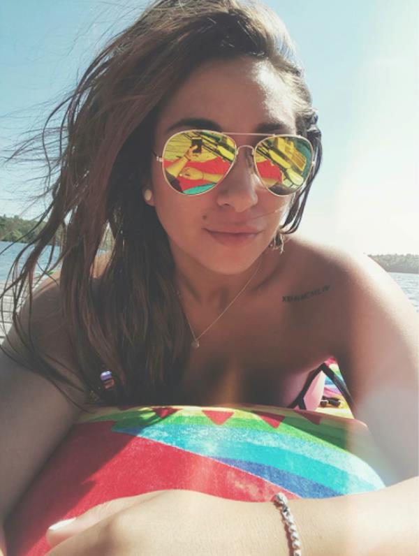 Alicia Michaela in a bikini taking a selfie