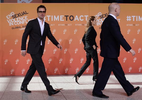 Angelina Jolie and Brad Pitt attend End Sexual Violence in Conflict Summit in east London, June 12, 2014