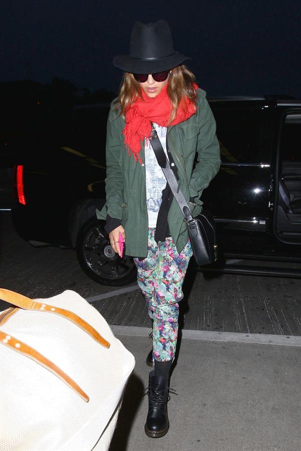 Jessica Alba arrives for an early morning flight at LAX, June 10, 2014