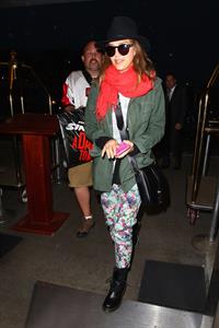 Jessica Alba arrives for an early morning flight at LAX, June 10, 2014