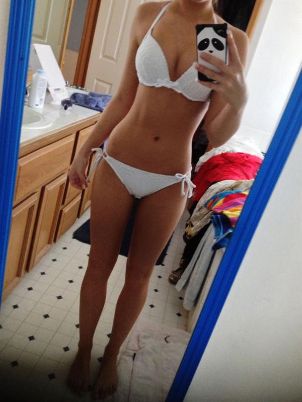 Danni Meow in a bikini taking a selfie