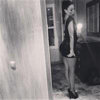 Nicole Minetti taking a selfie