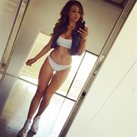 Ana Cheri in a bikini taking a selfie