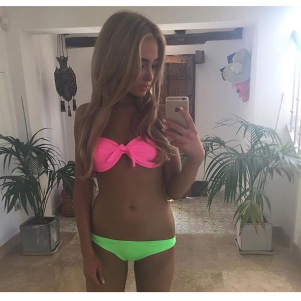 Nicola Hughes in a bikini taking a selfie