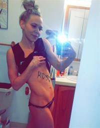 Anonymous in lingerie taking a selfie