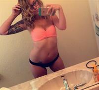 Anonymous in lingerie taking a selfie