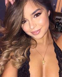 Demi Rose Mawby taking a selfie