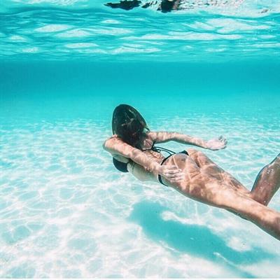 Devin Brugman in a bikini - ass