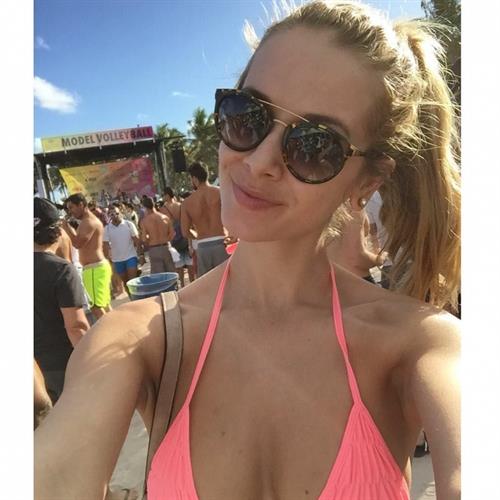 Olivia Jordan in a bikini taking a selfie