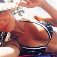 Pia Muehlenbeck in a bikini taking a selfie