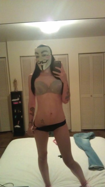 Anonymous in lingerie taking a selfie