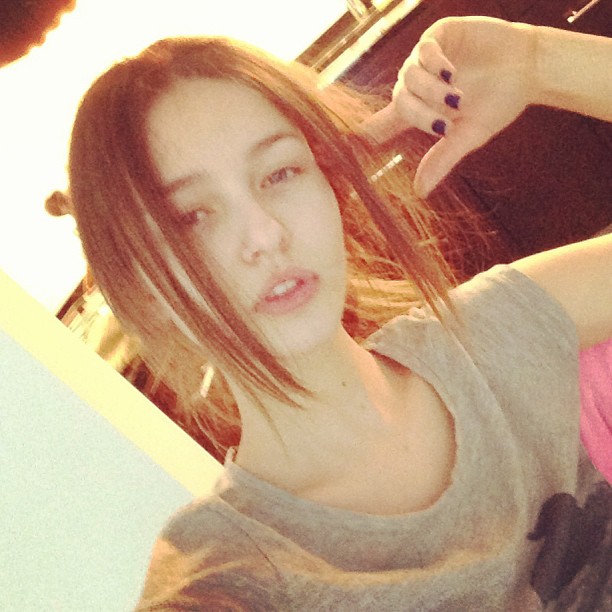 Kristina Romanova taking a selfie