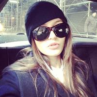 Kristina Romanova taking a selfie