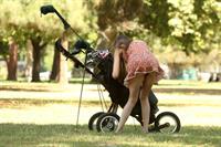 Alicia Arden golfing in a tiny skirt.  Upskirt pink panties.