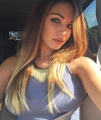 Jessica Ashley taking a selfie