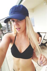Ava Sambora in a bikini taking a selfie