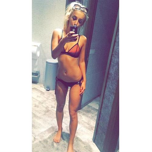 Tiffany Watson in a bikini taking a selfie