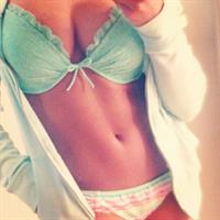 Audrey Allen in lingerie taking a selfie