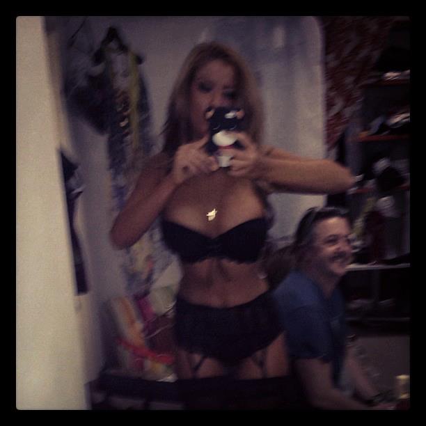 Andrea Ando in lingerie taking a selfie