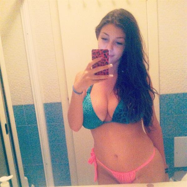 Carolina Neto in a bikini taking a selfie