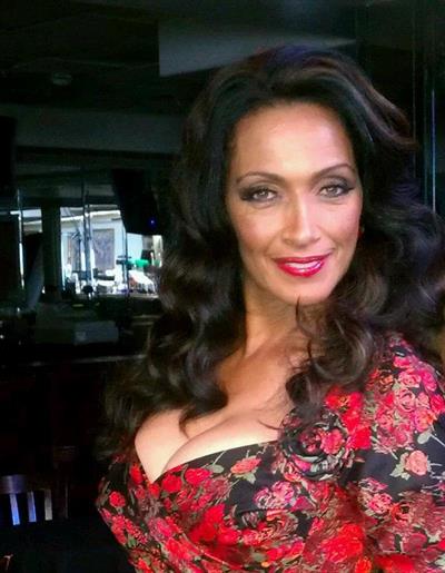 Kathleen Bradley from The Price is Right.  She was the first regular African American model to appear on the show.