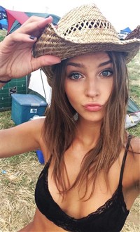 Rachel Cook in a bikini taking a selfie