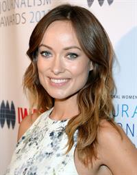 Olivia Wilde debuts her small baby bump while attending the 2013 International Women’s Media Foundation’s Courage in Journalism Awards at the Beverly Hills Hotel on Tuesday (October 29, 2013) in Beverly Hills, Calif.